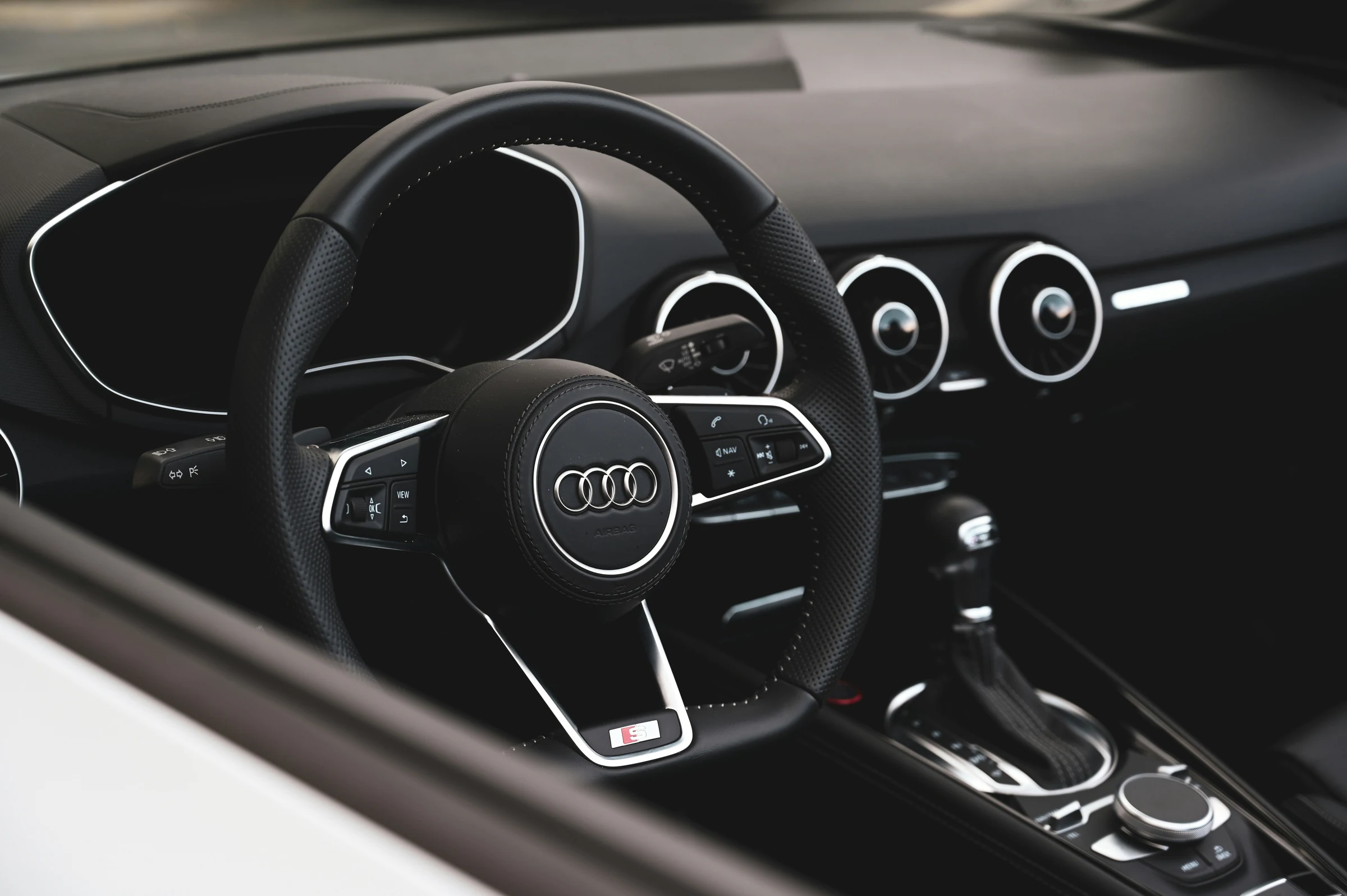 Audi TT cabin, steering wheel and turbine air vents